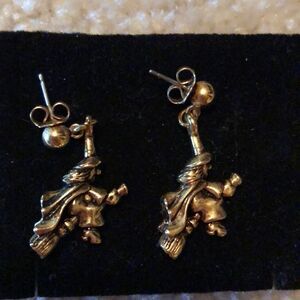 Witch pierced earrings.